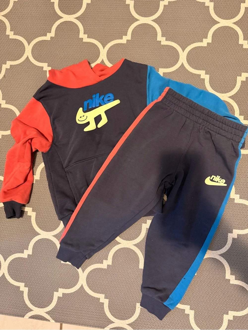 Nike Kids Navy Joggers with Blue & Red Accent and Neon Logo